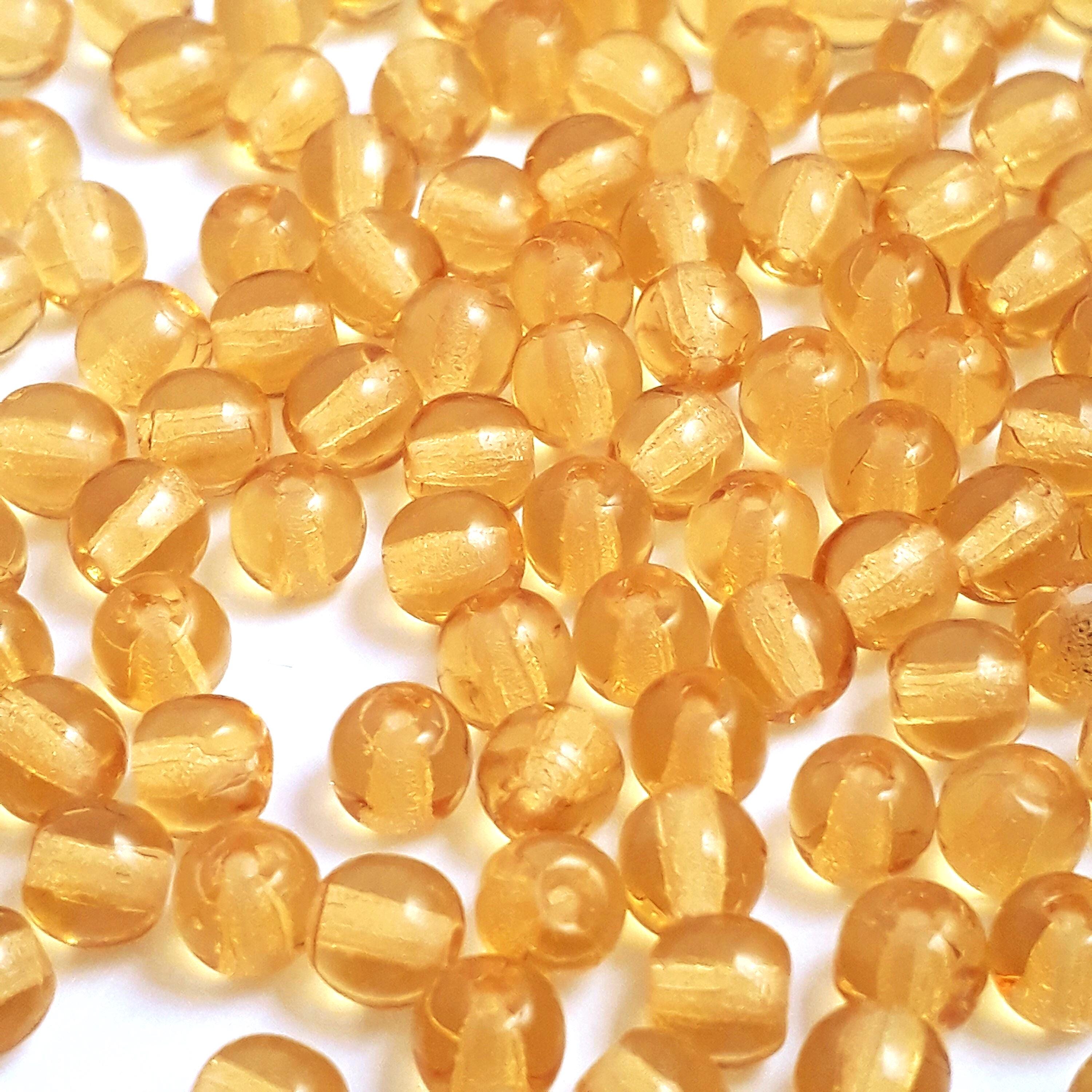 Transparent Amber Czech Glass Druk Round 4mm - 60pcs