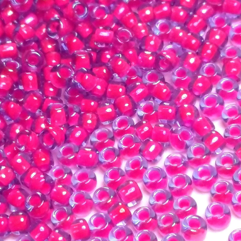Luminous Lt Sapphire / Neon Pink-Lined TOHO Seed Glass 11/0 - 10g