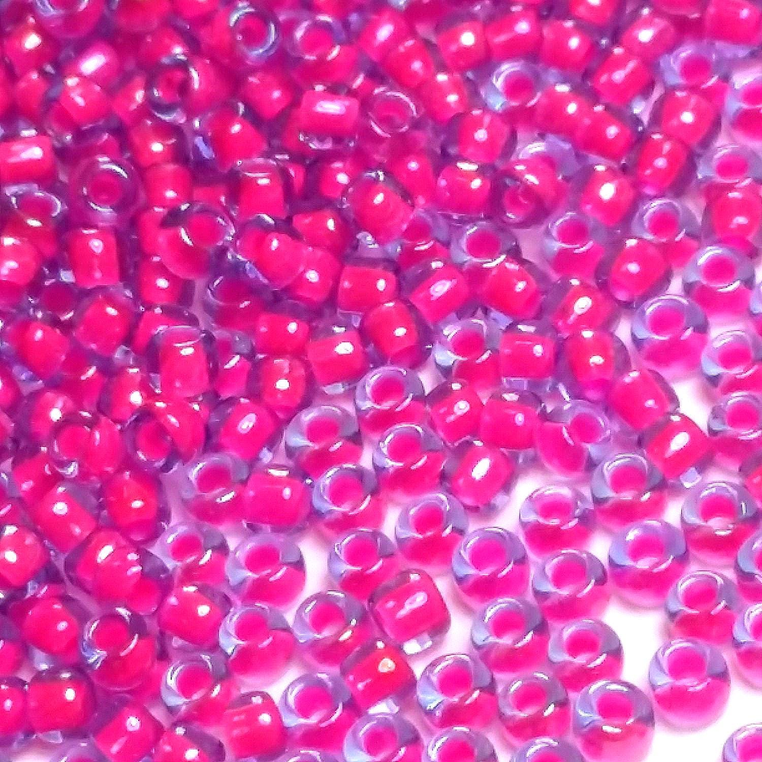 Luminous Lt Sapphire / Neon Pink-Lined TOHO Seed Glass 11/0 - 10g
