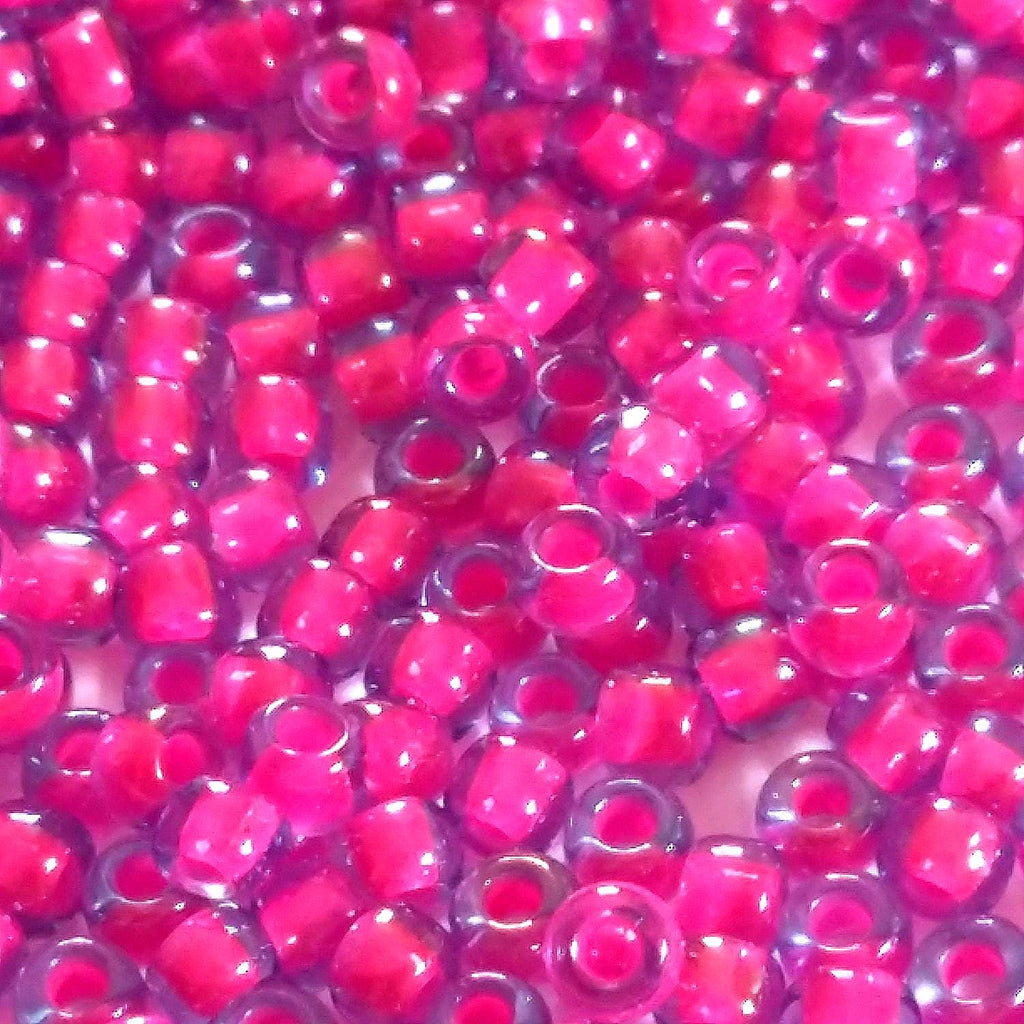 Luminous Lt Sapphire / Neon Pink-Lined TOHO Seed Glass 11/0 - 10g