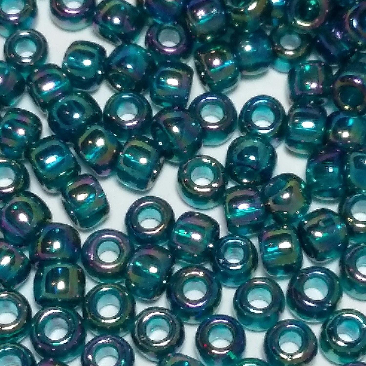 Transparent-Rainbow Teal TOHO Seed Glass 6/0 - 10g